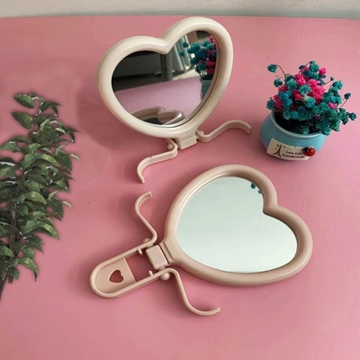 Vrouwelijke kleding Hartvormige zak Verstelbare make-up Compacte mini spiegel met Qualit