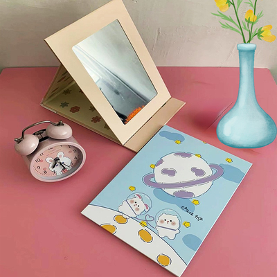 Gecoat papier en glazen spiegel De ideale combinatie voor een schattige opvouwbare make-up spiegel